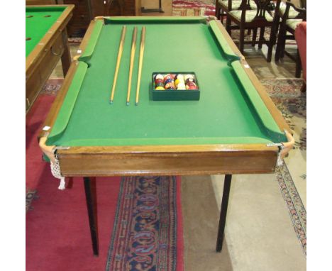 A half-size slate bed snooker/billiards table, 191 x 100cm overall, together with cues and balls.