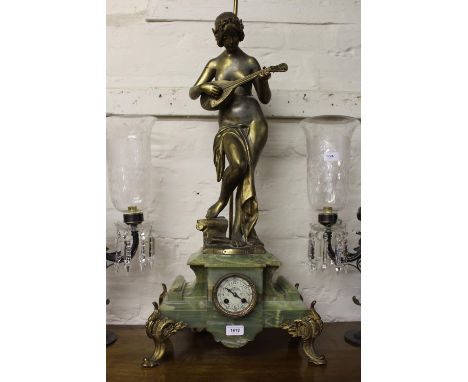 Large 19th Century French green marble and gilt metal mounted mantel clock / lamp, mounted with a gilded spelter figure of a 