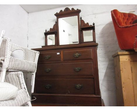 Late Victorian walnut dressing chest, with swing mirror above drawers on a plinth baseGood condition. Some scuffs from wear. 