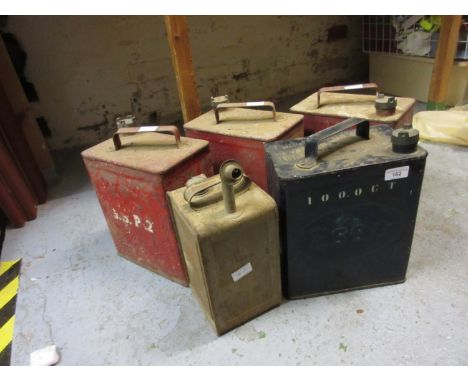 Esso petrol can and four other various vintage petrol cans 