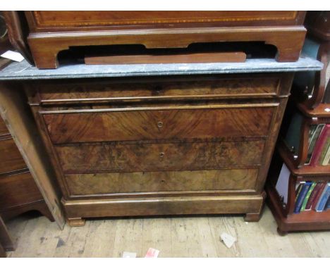 19th Century French walnut commode with a grey flecked marble top above four long drawers on a plinth base and shaped feet 