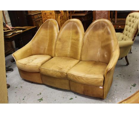 Mid 20th Century tan leather four piece sitting room suite of stylised tub design, comprising: three seat sofa, two seat sofa