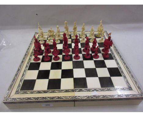 19th Century Vizagapatam ivory and horn folding chessboard / backgammon board, together with a 19th Century Chinese red stain