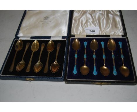 Cased set of six Continental silver gilt enamel decorated coffee spoons, together with a cased set of six Mappin and Webb sil