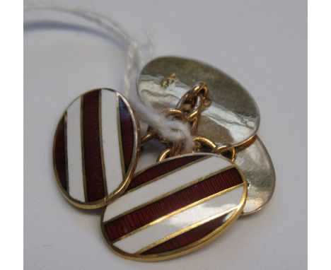Pair of 9ct gold enamel decorated cufflinksWeight = 6.8g 
