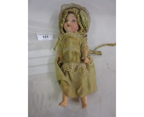 Small Goebel bisque headed doll marked 14/0 Germany with sleeping eyes and open mouth on a jointed composition body, wearing 