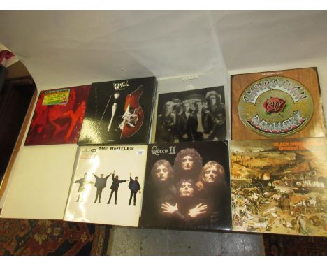 Extensive collection of vinyl long playing records, including: The Beatles, The Who, Queen, The Grateful Dead, Black Sabbath,