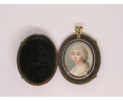 18th Century / early 19th Century gold and blue enamel framed head and shoulder miniature portrait of a lady in white blouse,