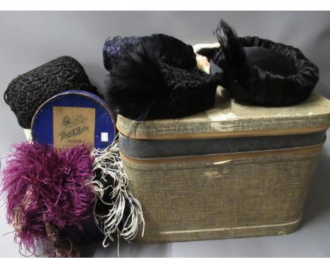 Small rectangular trunk containing a collection of various fur and feather hats, two ostrich feather boas and a fur muff, tog