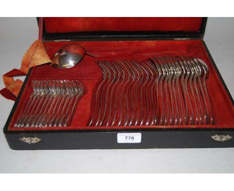 Cased set of twelve silver plated Old English pattern dinner forks, twelve tablespoons, a ladle and twelve similar Fiddle and