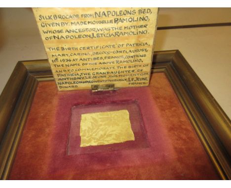 Fragment reputedly from the silk brocade of Napoleon Bonaparte's bed, mounted below a miniature painting of Napoleon on horse