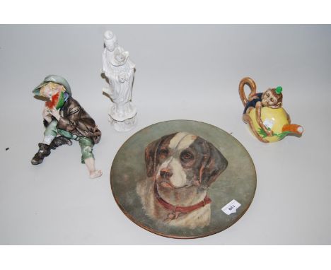 Torquay terracotta plate hand painted with a portrait of a dog, 12.5ins diameter, together with a reproduction Minton teapot 