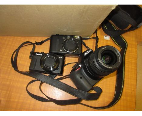 Nikon D3300 digital SLR camera, Canon G7X digital camera, Canon G9 Powershot digital camera and a quantity of other miscellan