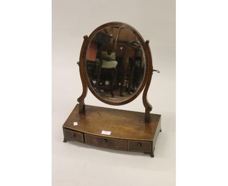19th Century mahogany oval swing frame dressing table mirror with three jewel drawers on bracket feet 