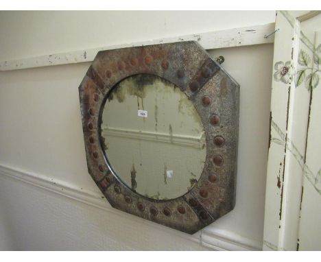 Early 20th Century silvered on copper octagonal framed mirror with circular bevelled plate, 24ins square 