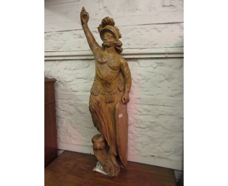 Large 18th Century carved pine figure of a classical female warrior wearing a plumed helmet, one arm held aloft, the other su