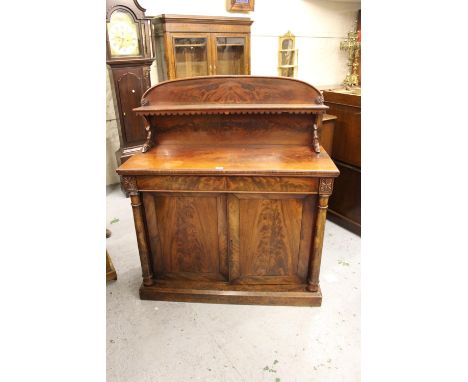 Victorian figured mahogany chiffonier, the low shelf back above a drawer and pair of cupboard doors flanked by turned pilaste