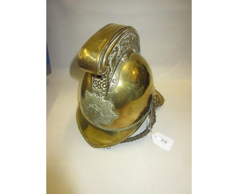 19th Century brass fireman's helmet with original leather insert and strap, made by Merriweather & Sons Firemans Outfitters L