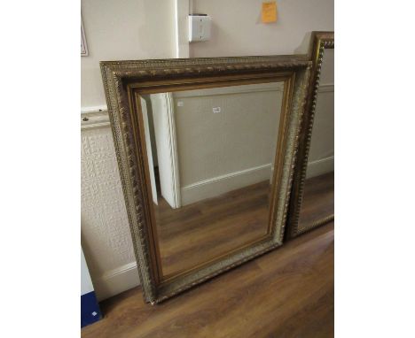 Large 20th Century rectangular gilt framed mirror in 19th Century style with gilt slip and bevelled plate, 40ins x 50ins 