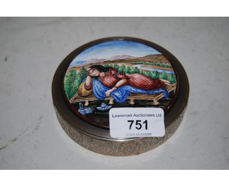 Circular Middle Eastern white metal and enamel box, the lid decorated with a female figure reclining on a day bed in a landsc