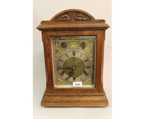 Edwardian oak mantel clock, the gilt dial with a silvered chapter ring, Roman numerals, slow / fast and chime silent selector