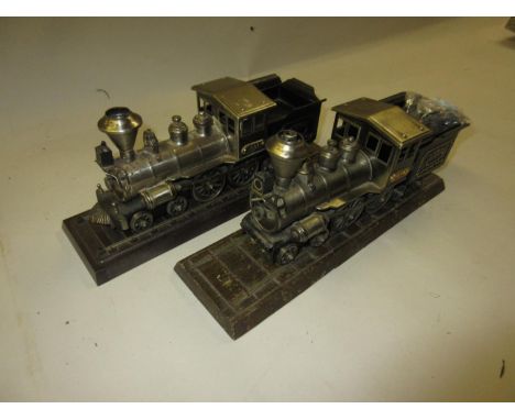 Two metal table cigarette lighters in the form of steam engine locomotives 