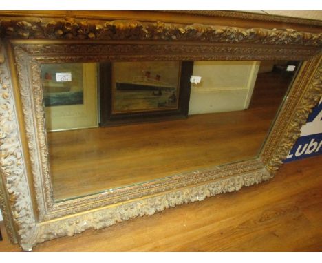 Large 19th Century rectangular gilt moulded composition wall mirror, 34ins x 53ins 