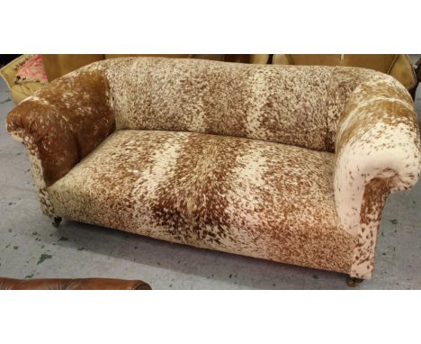 Late 19th or early 20th Century two seat Chesterfield type sofa, re-upholstered in cream / tan mottled cow hide, 72ins wide, 