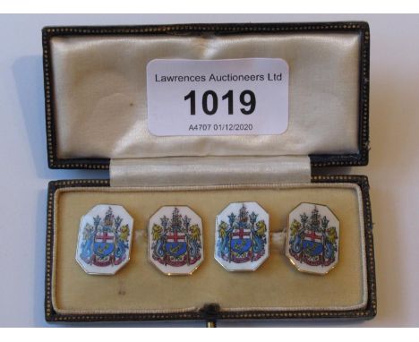 Pair of 15ct yellow gold cufflinks enamel decorated with coat of arms, in original presentation box 