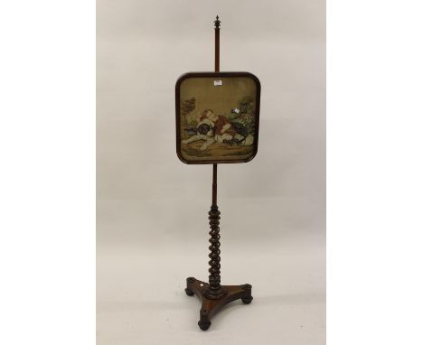 19th Century rosewood adjustable firescreen with needlework insert panel depicting a child sleeping with a dog in a landscape