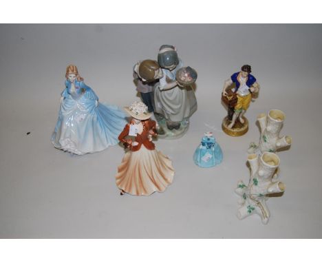 Three Coalport figures, LLadro group of a boy and girl, Sitzendorf figure of a man with a birdcage and a Belleek vase in the 