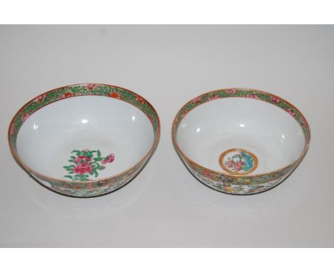 Two 20th Century Canton enamel bowls having floral decoration and gilded rims, 8ins and 9ins diameterBoth in excellent condit