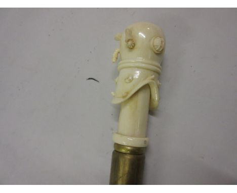 Walking stick with carved bone handle in the form of a divers helmet 