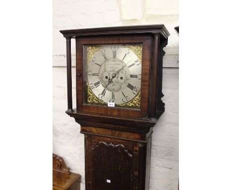 George III oak and mahogany longcase clock, the square hood above an arched panelled door and conforming plinth base, the squ