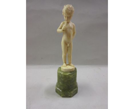 Ferdinand Preiss, small Art Deco carved ivory figure of a nude boy playing a horn mounted on an onyx plinth base, signed in t