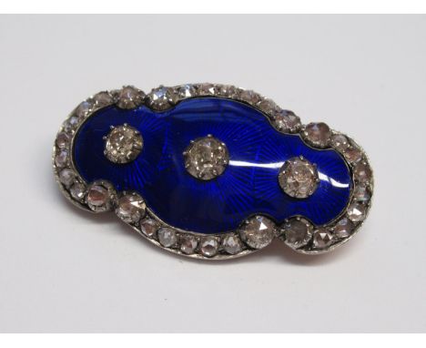 Victorian blue enamel and diamond set brooch, the three centre old mine cut diamonds approximately 0.75ct total 