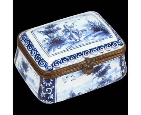 Delft blue and white pottery box of bulbous rectangular form, hinged metal rim with ogee sides, 7.5cm x 5.5cm Light glaze cra