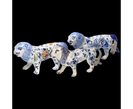 3 French faience glaze polychrome lions, length 12cm Light glaze crazing