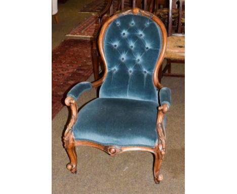 A Victorian button back open arm nursing chair 