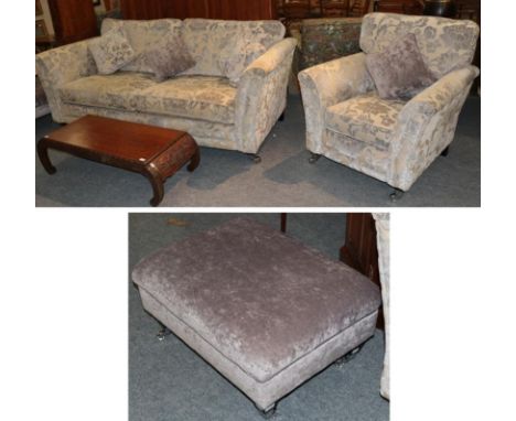 A Barker &amp; Stonehouse modern four seater sofa with floral upholstery, together with a matching armchair and footstool, so