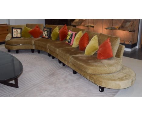 A Roche Bobois French curved sofa in gold crushed velvet, 540cm wide by 225cm deep by 167cm .  Good condition. The velvet uph