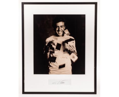 An original photographic portrait of Fernando Alonso, signed beneath by the subject, from the Kraken Opus publicity shoot for