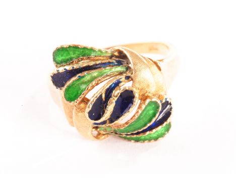 An 18ct gold and enemalled dress ring, the retro style large tablet with champleve green and blue enamel, approx 7.3g 