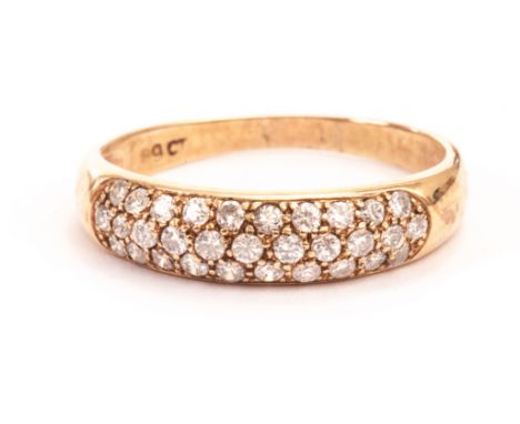 A 9ct gold and diamond bombe dress ring, having three rows of brilliant cuts to the tablet 