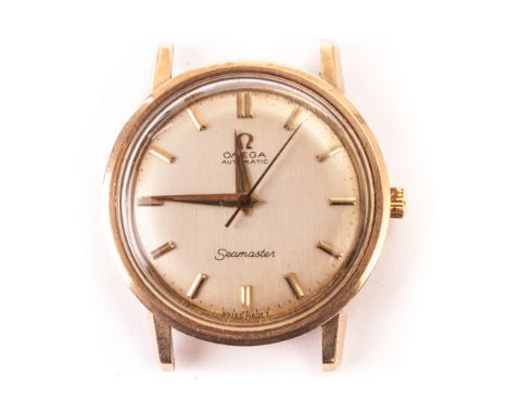 A vintage Omega Automatic Seamaster gentleman’s wristwatch, in yellow metal case, having gilt satin dial with baton numerals,