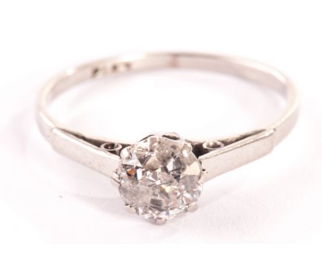 A platinum solitaire diamond ring, with old cut stone 2.5g Notable carbon inclusions to the stone which can be viewed with th