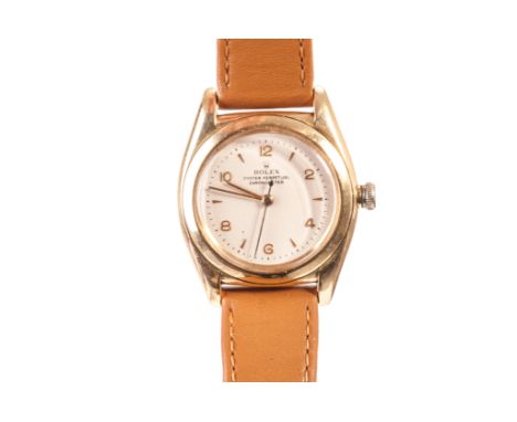 A vintage gold Rolex Automatic Bubbleback wristwatch, circular dial with baton and numerals, marked Oyster Perpetual Chronome