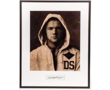An original photographic portrait of Wayne Rooney, signed in pen beneath by the subject, from the Kraken Opus publicity shoot