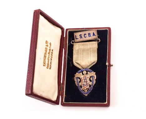 A silver and enamel London & Southern Counties Bowling Association medal, in case with an LSCBA silver pin badge (3) 