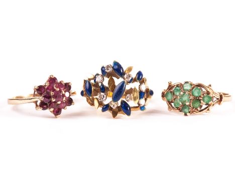 Three gold and gem set dress rings, one in 18ct gold with abstract pierced tablet of blue enamel and clear stones, one cluste